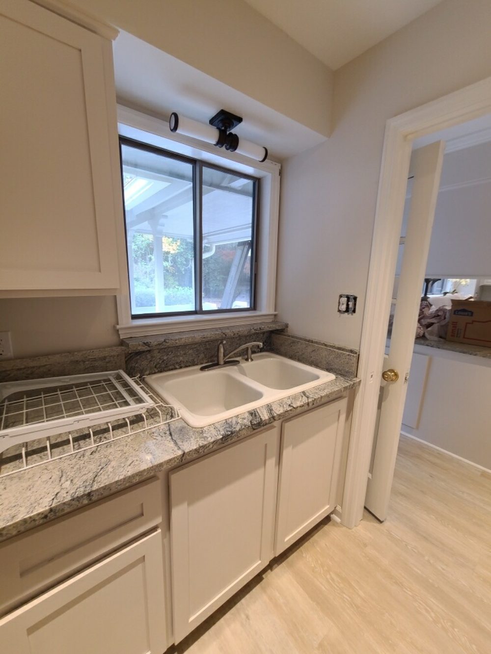 Bathroom cabinets and vanity finished in white