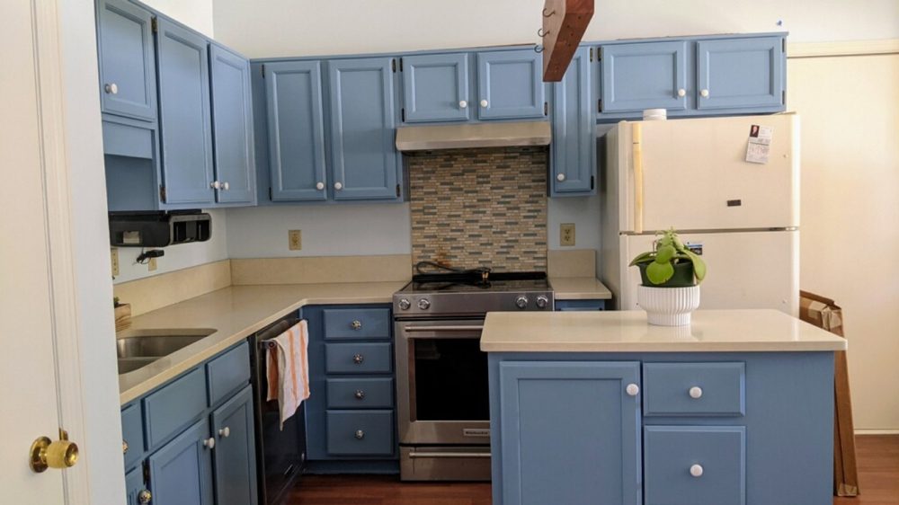 Kitchen with blue painted cabinets