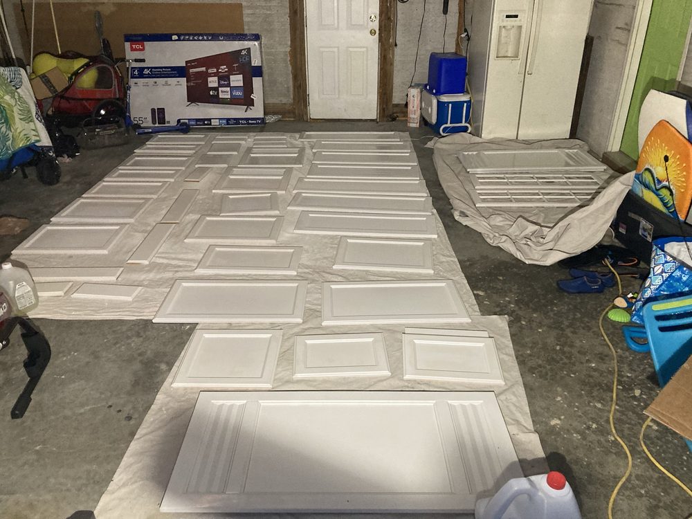 Cabinet doors being serviced in the shop
