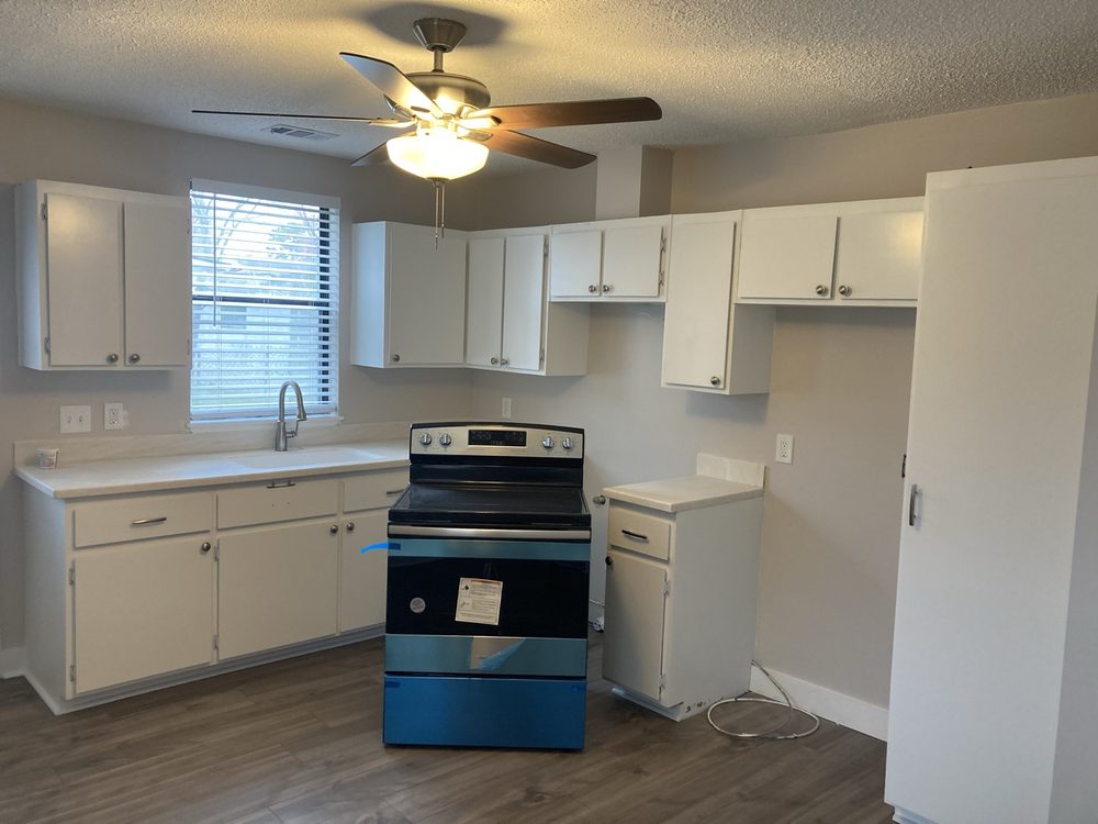 Refinished white kitchen with new range